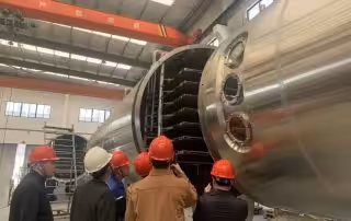Minjie vacuum low temperature continuous dryer successfully passed FAT